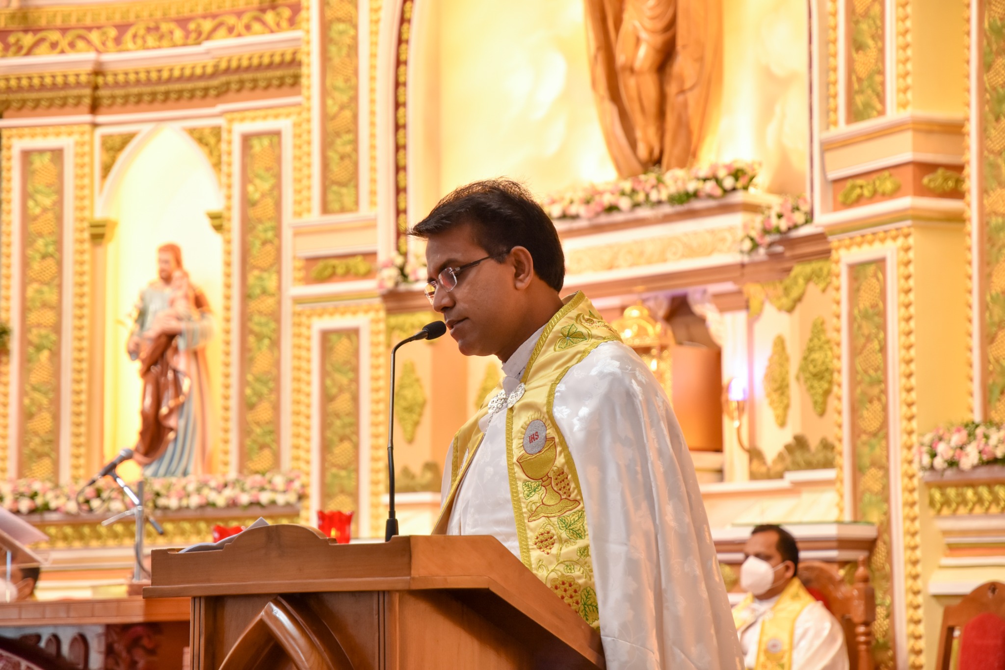 Fr. Dr. Davis Panadan proclaiming the Word during Holy Qurbana